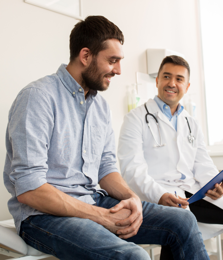 Male patient sitting with male doctor